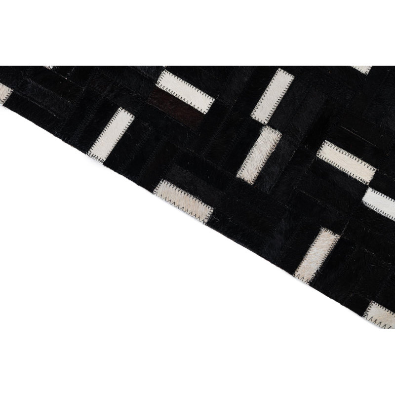 Tapis noir Isidore