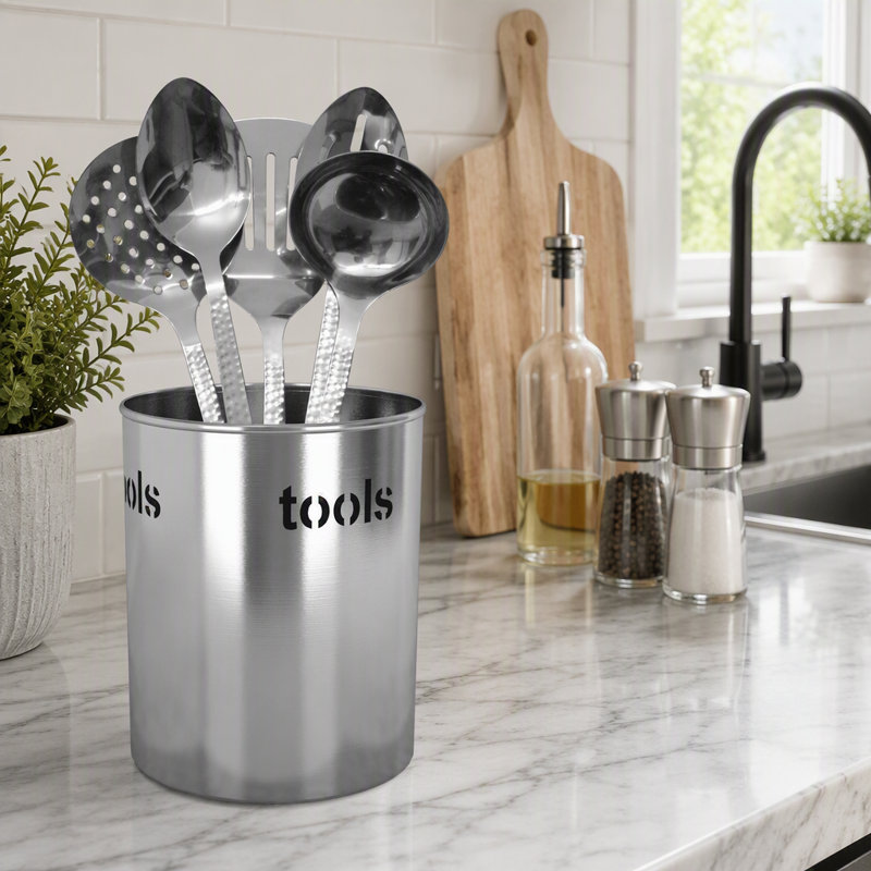 Porte-ustensiles en acier inoxydable brossé avec découpes pour outils, idéal pour les cuisines modernes. Durable et résistant à la rouille.
