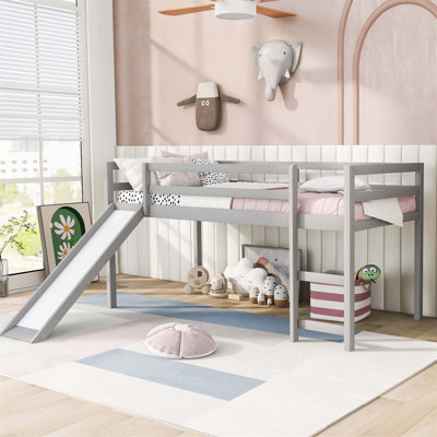 Lit mezzanine multifonctionnel avec glissoire et échelle, idéal pour les petits espaces, offrant confort, sécurité et amplement de rangement