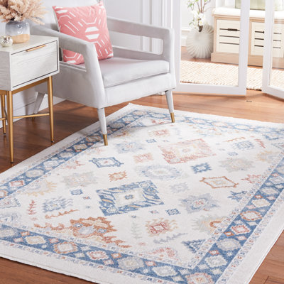 Tapis beige / bleu Huitt lavable 218