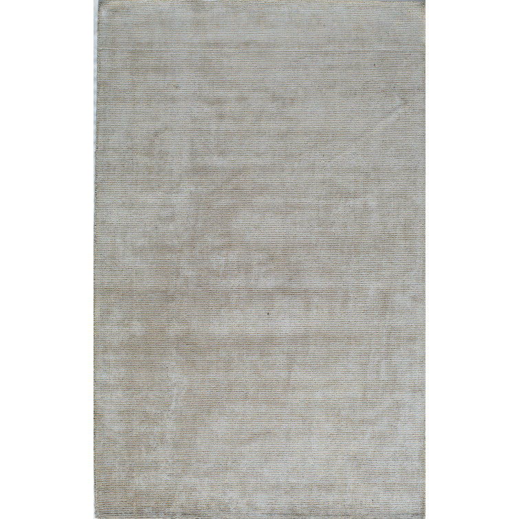 Tapis gris touffeté à la main
