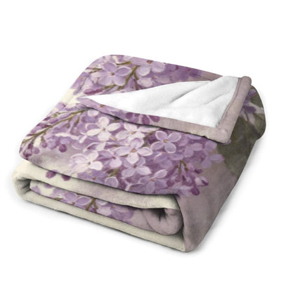 Jeté en flanelle mauve à fleurs mauves mauves, couverture douce et chaude pour le canapé-lit du salon