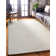 Jalissia Faux Rabbit Fur Hand Tufted Solid Color Rug