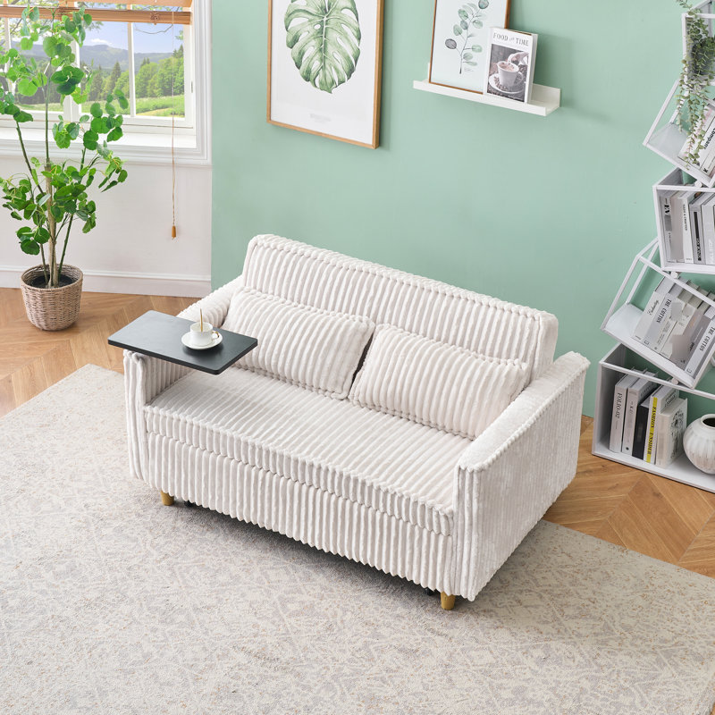 Confortable convertible en velours côtelé beige avec plateau de table mobile et, améliorant votre confort et votre table, pour travailler