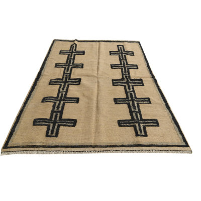 Tapis beige Iniguez