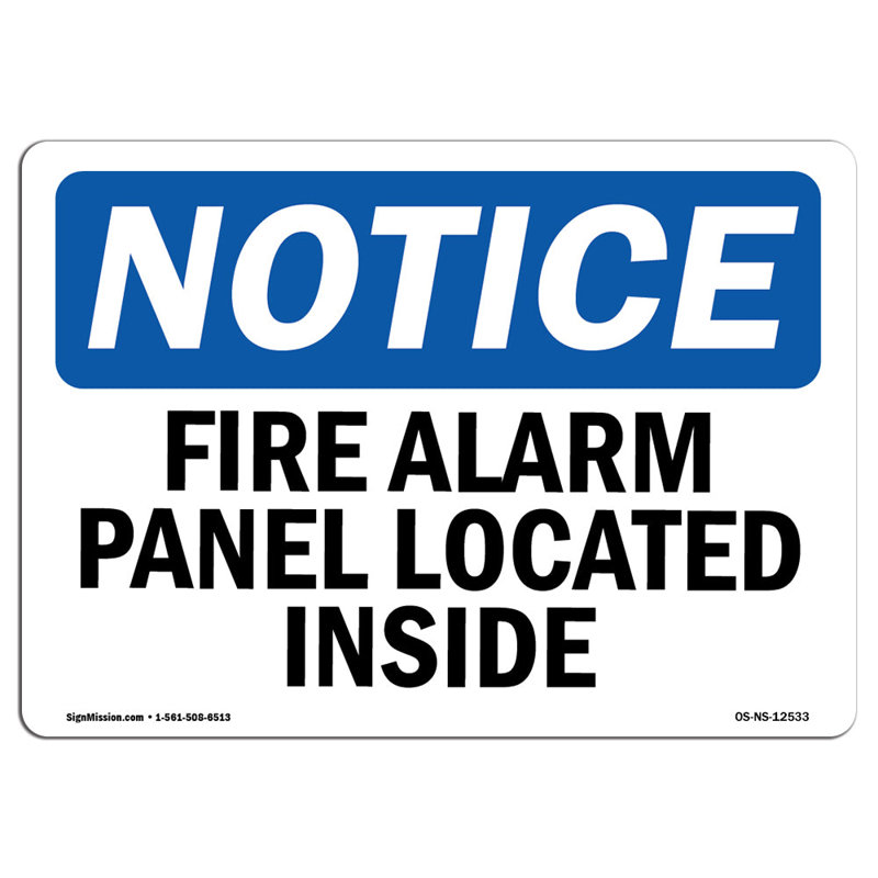 Panneau d’alarme-feu situé à l’intérieur de l’enseigne