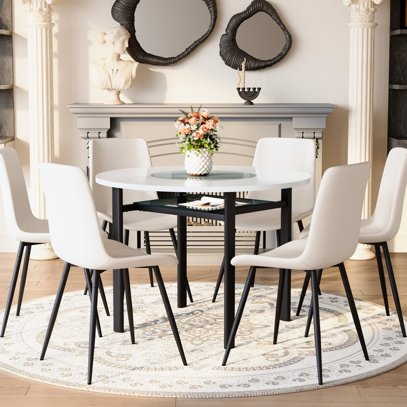 Ensemble de table de salle à manger moderne blanc avec coussins incurvés, verre et métal