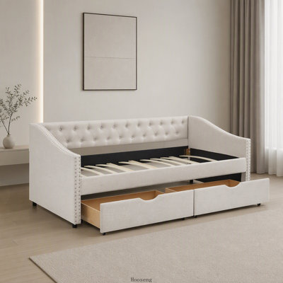 Lit de jour simple rembourré capitonné avec tiroirs de rangement, dossier à boutons et accoudoirs cloutés en cuivre, beige, élégant lit de jour d'invité
