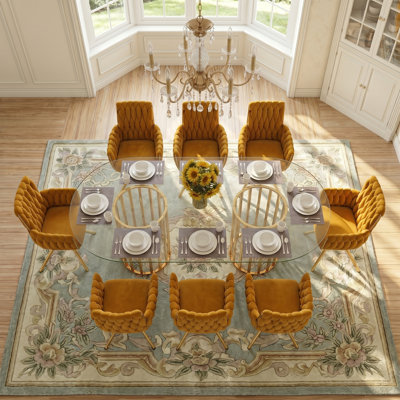 Ensemble de table de salle à manger ovale en verre de luxe moderne pour 6 personnes, meubles de salle à manger de cuisine à domicile avec structure en métal robuste, chaises ergonomiques rembourrées en velours, plateau de table transparent, chaises jaunes