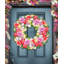 Cintre de porte en bois à couronne de printemps