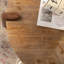Table basse ronde à chevrons avec pieds fuselés