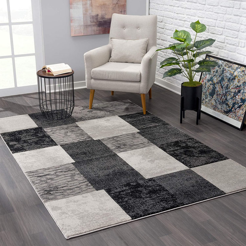 Tapis de couloir gris à blocs géométriques