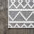 Michela High-Low Pile Knotted Trellis Geometric Black/Ivory Indoor/Outdoor Rug-607497376
