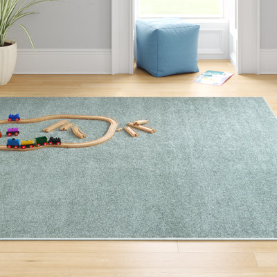 Arzel Solid Low-Pile Aqua Blue Rug