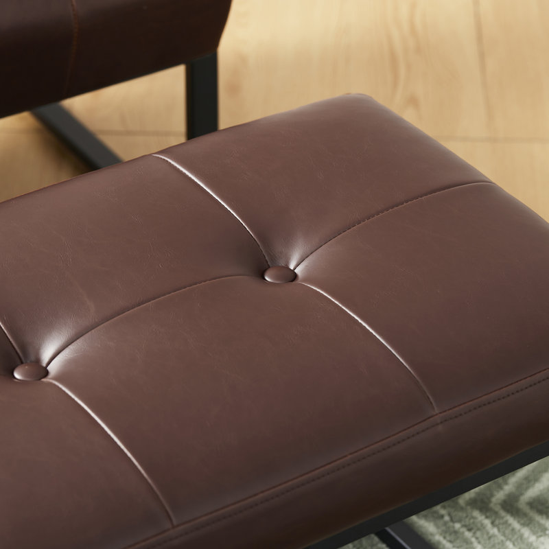 Fauteuil et repose-pieds en cuir Buren, Simili cuir brun foncé