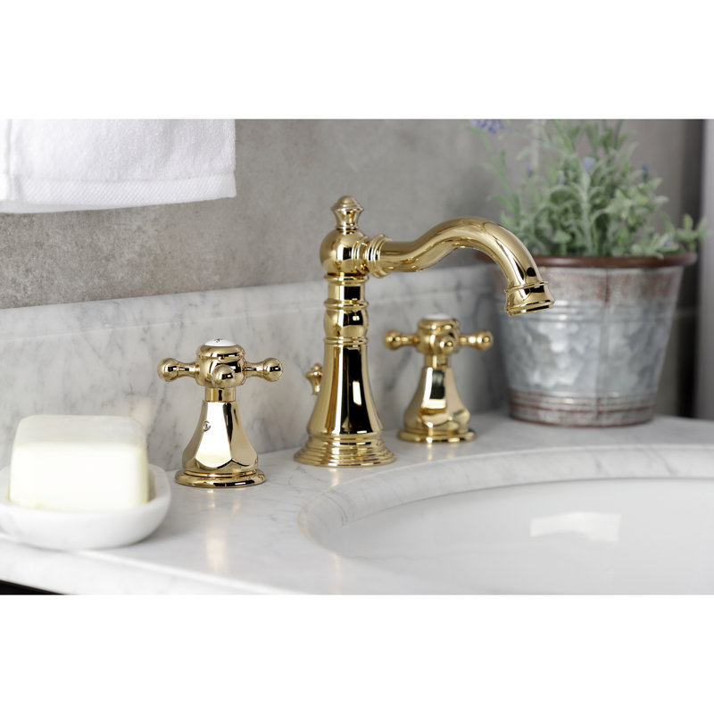 Robinet de salle de bain espacé à deux poignées à 3 poignées avec bonde escamotable Kingston Brass Metropolitan, Laiton poli