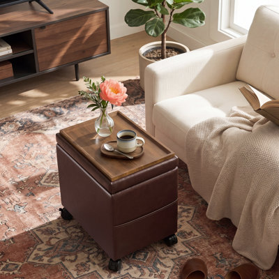 Rolling Faux Leather Storage Ottoman With Reversible Wooden Tray
