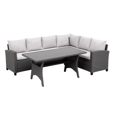 Herlihy Garden Rattan Dining Set with L Shape Sofa Rectangular 6 - Person 144cm Long Dining Set with Cushions