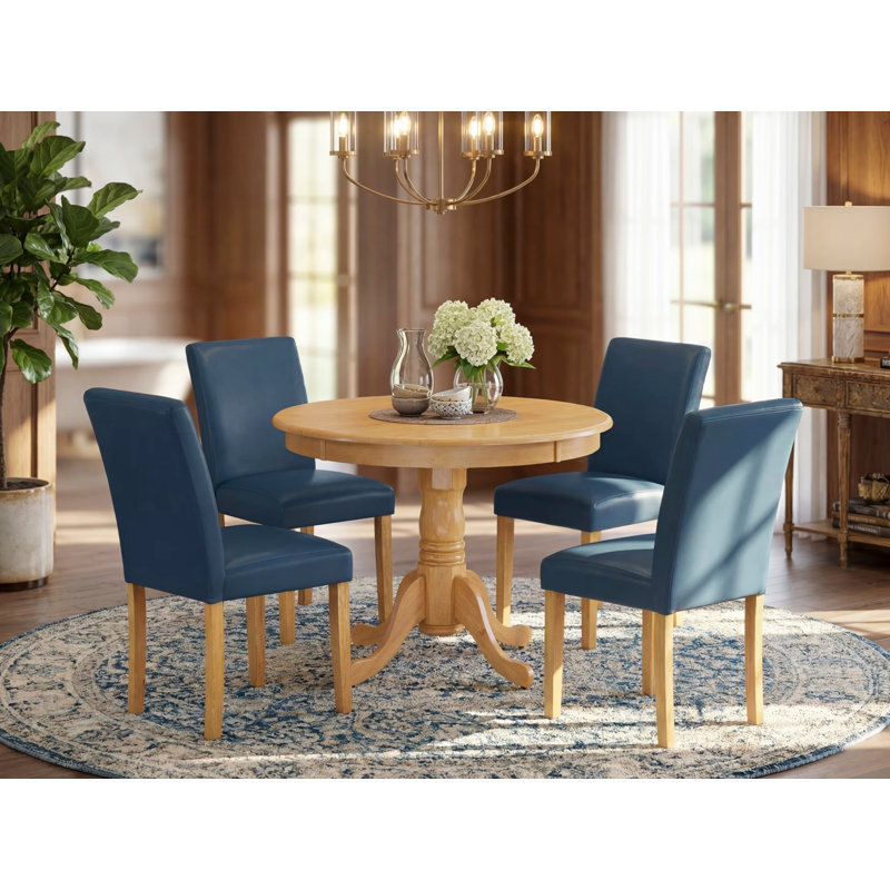 Ensemble de table de salle à manger 5 pièces comprenant une table de cuisine ronde avec piédestal et 4 chaises Parson revêtues de similicuir bleu Oasis