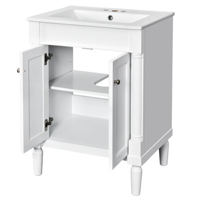 Meuble-lavabo 24 po. Style moderne. Lavabo en céramique. Blanc. Vaste espace de rangement. Charnières. Meuble-lavabo à poignée en métal exquis. Cadre. Tableaux. Grand rangement. Robinet de 4 po