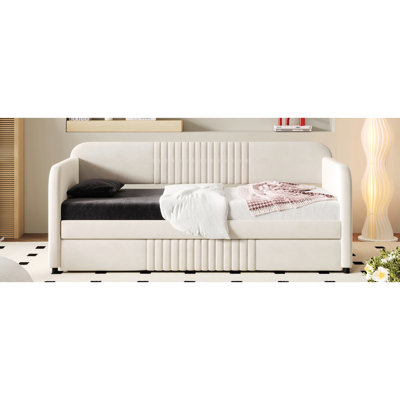 Lit de jour rembourré beige avec lit gigogne et lattes de bois, confortable, construction, gigogne simple, lit gigogne, beige, structure en contreplaqué,