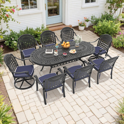 9-Piece 81.89"L Oval Patio Dining Set with Umbrella Hole, 2 Swivel + 6 Stackable Chairs with Blue Cushions