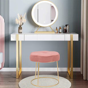Repose-pieds rond en velours rose