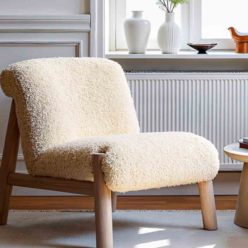 Fauteuil de loisirs rétro crémeux pour se détendre., Non