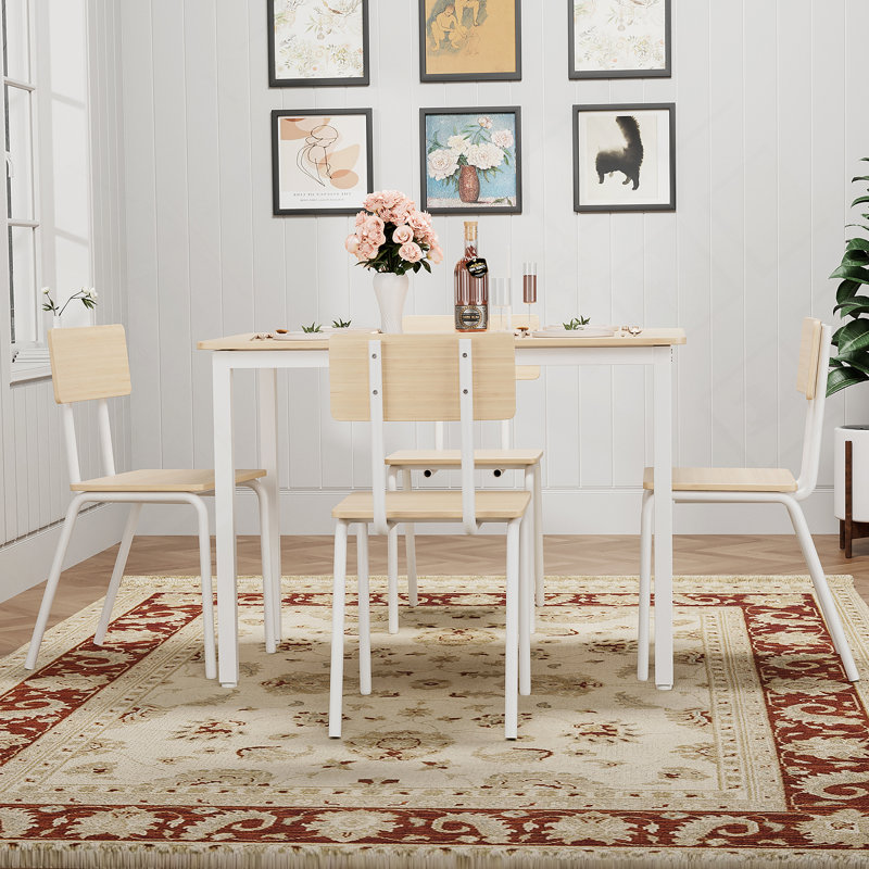 Ensemble de table de salle à manger élégant de 5 pièces avec 4 chaises, parfait pour créer une atmosphère de salle à manger harmonieuse dans n'importe quelle maison