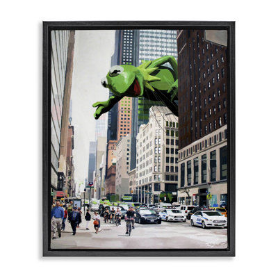Personnage de grenouille sur un cadre flottant, conçu par Keith Thomson