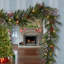 The Holiday Aisle® 9 ft. Bristle Berry Pine Garland with Battery Operated LED Lights