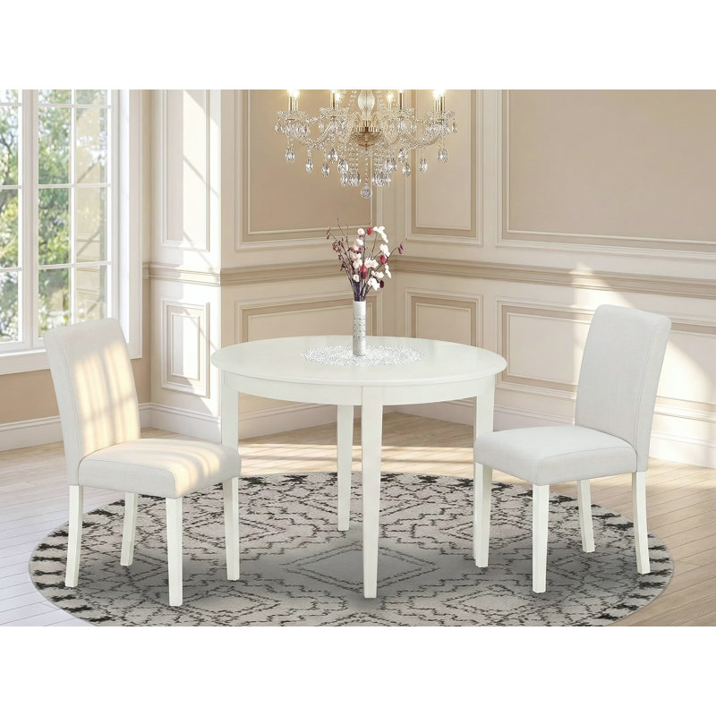 L'ensemble de salle à manger 3 pièces comprend une table de cuisine ronde et 2 chaises de salle à manger Parson en similicuir blanc, 42 x 42 pouces, lin blanc