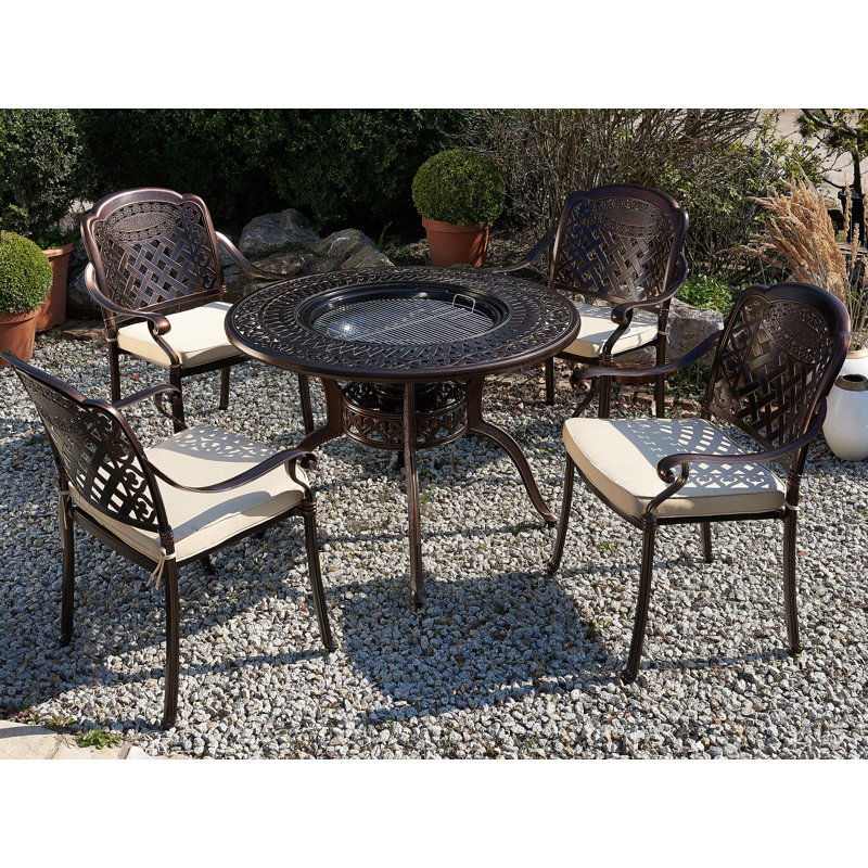 Frame 4 - Person Patio Dining Set with Round Table , Cushions Included