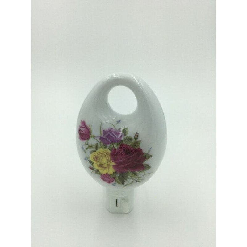 Fleurs assorties Nalany sur une veilleuse ovale