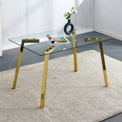 Table de salle à manger moderne moderne minimaliste avec plateau en verre trempé et pieds en métal doré
