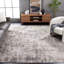 Tapis abstrait en polyester / polypropylène beige / gris foncé tissé à la machine-1325234590