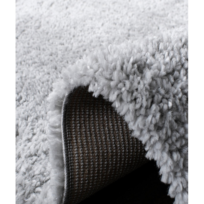 Tapis uni en polyester tissé à la machine en gris, Rectangle 6 pi 7 po x 9 pi 6 po