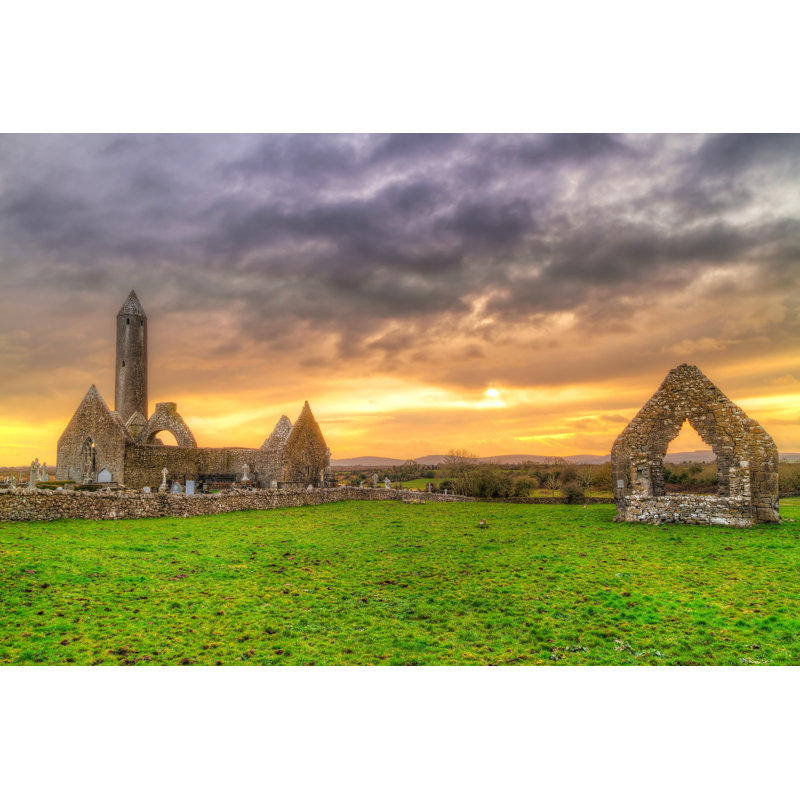 Kilmacduagh Monastery With Stone Tower At Sunset by Patryk_Kosmider - Wrapped Canvas Print, 30cm H x 46cm W x 3.8cm D