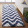 Delane Handmade Tufted Ivory/Blue Area Rug