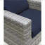 Fauteuil club en osier Sunbrella