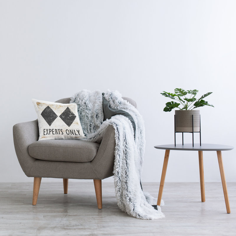 Coussin décoratif à motif de losanges avec experts seulement par Peter Horjus