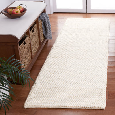 Natura Solid Color Area Rug In Ivory