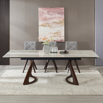 La table escamotable rétractable en imitation de pierre de 63 po à 94,48 po peut accueillir 6 à 8 personnes. Résistant à la chaleur, résistant aux égratignures, carbone, bois de noyer massif, base pour table de salon