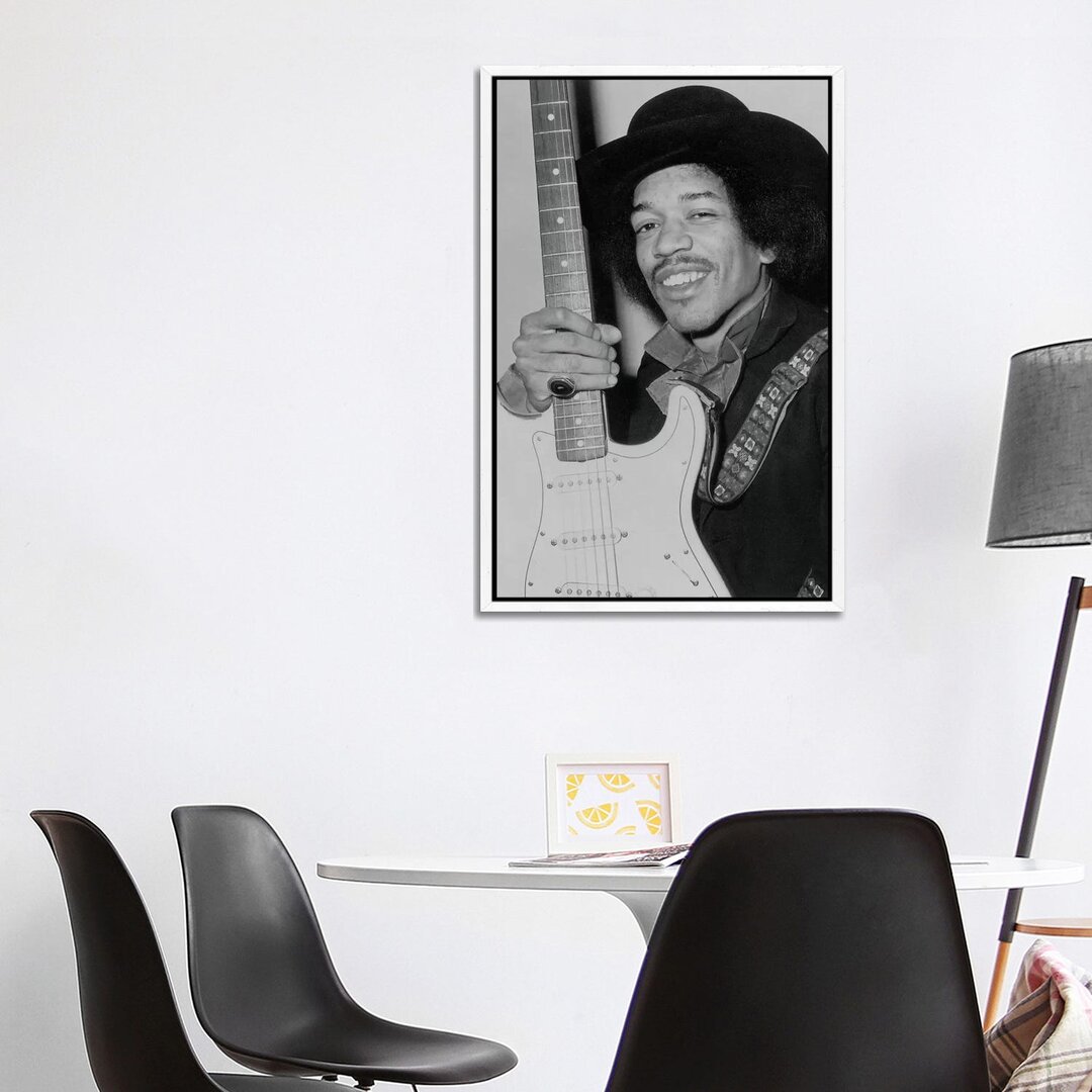 Leinwandbild A Smiling Jimi Hendrix Holding His Guitar von Radio Days