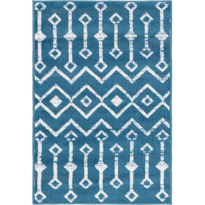 Tapis contemporain Aemtenan couleur océan