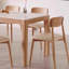 Table de salle à manger moderne et simple avec dalle de roche.-788392077