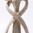 Beige Couple Sculpture, 8.3-Inch Abstract Infinity Embrace Resin Figurine with Sandstone Finish 