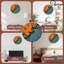 Horloge murale abstraite orange et bleue