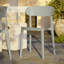 Chaise empilable d'extérieur Janicka Spencer-873142995