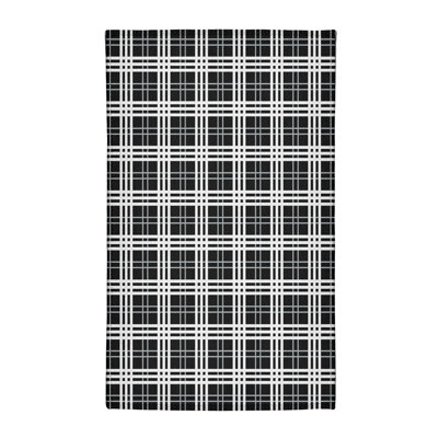 Tapis noir à carreaux
